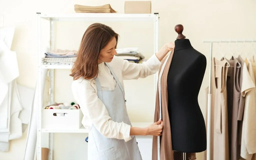 Independent Clothing Brand Designer Is Measuring Clothes Independent Clothing Brand Designer Is Measuring Clothes