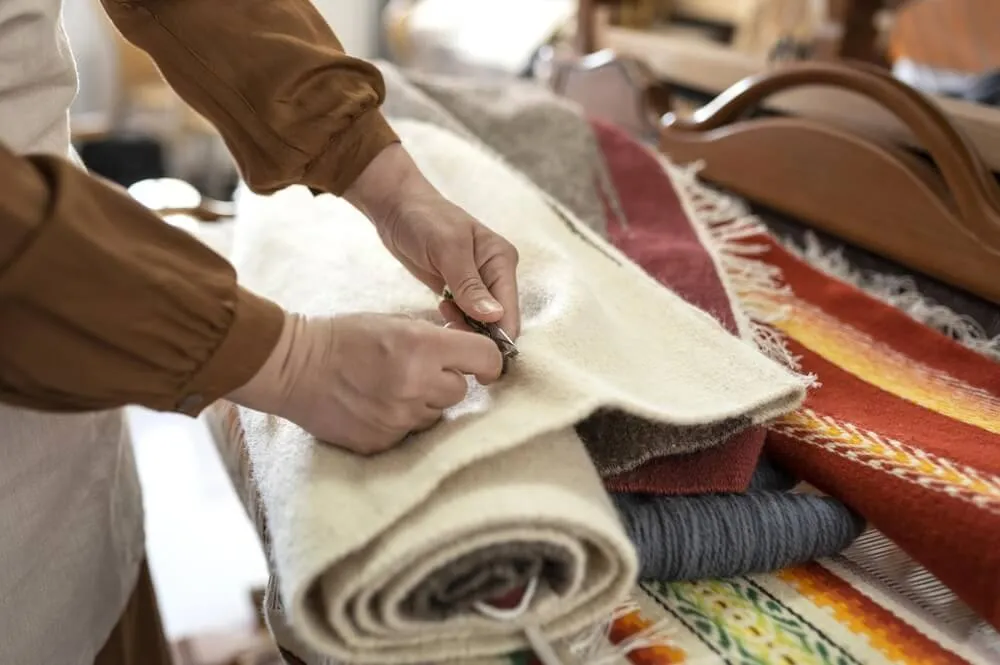 Workers Are Carefully Selecting Fabrics Workers Are Carefully Selecting Fabrics