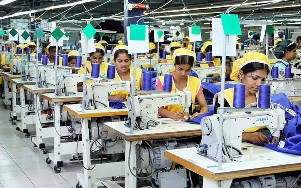 Workers In A Garment Factory Are Making Clothes Workers In A Garment Factory Are Making Clothes