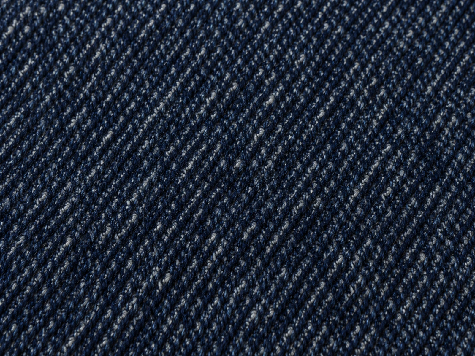 Close-Up Of 12 Oz Indigo Denim Fabric Twill Close-Up Of 12 Oz Indigo Denim Fabric Twill